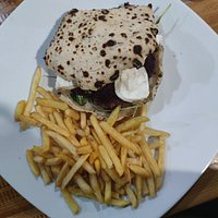 Off-Street signature dishes Truffle BurgerClassic CheeseburgerOff-Street Loaded FriesChicken Wings